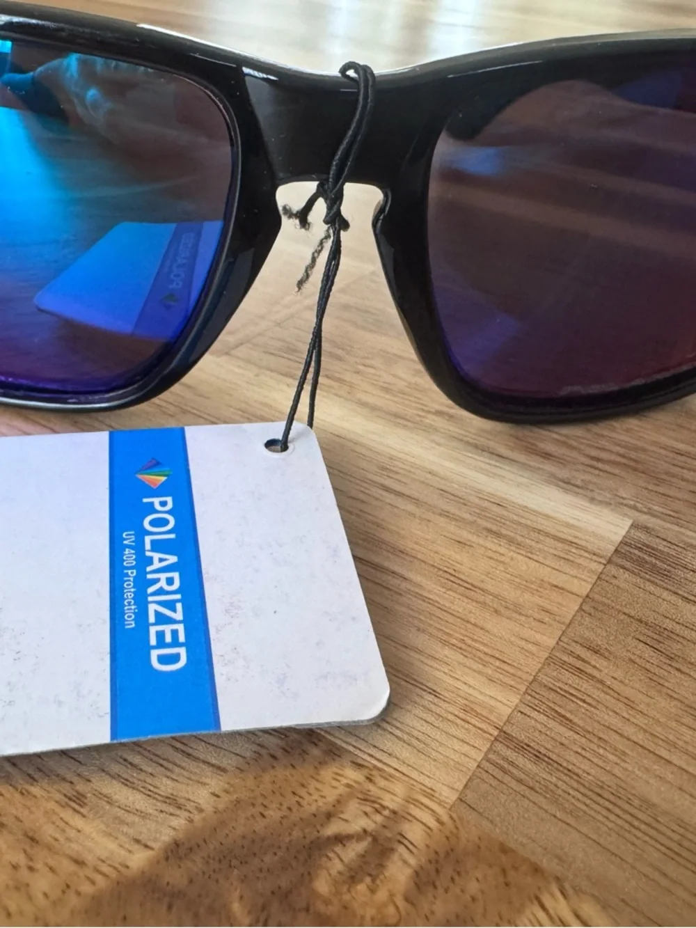 2 Oakley style kids Sunglasses polarized lenses. Not sure if authentic NWT